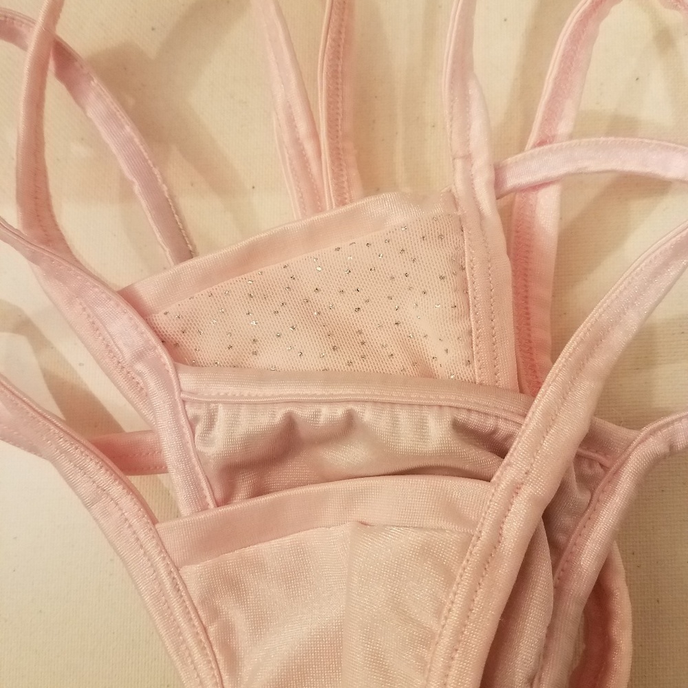 Three light pink panties.